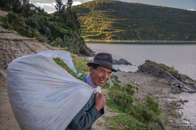 Portrait of smiling woman in river