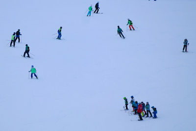 People skiing in snow