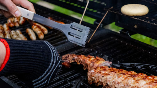 Close-up of meat on barbecue grill