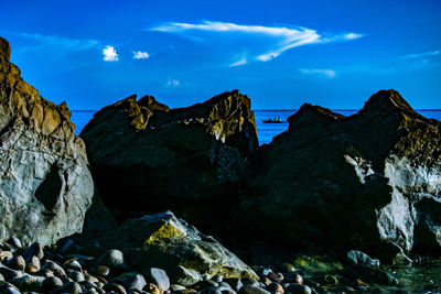 Panoramic view of rock formations against sky