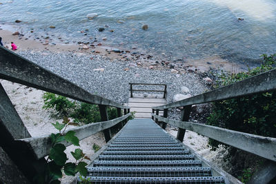 High angle view of footbridge over sea