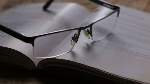 High angle view of book on table