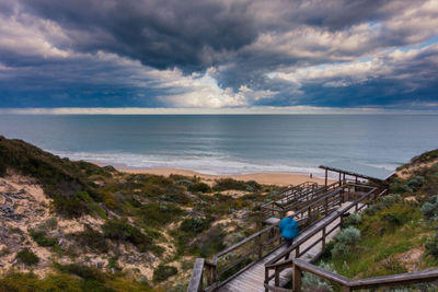 Scenic view of sea against cloudy sky