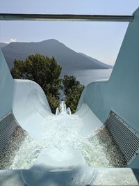 Scenic view of swimming pool against sky