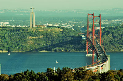 The 25 de abril bridge and christ the king statue, lisbon 