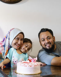 Portrait of smiling family during birthday