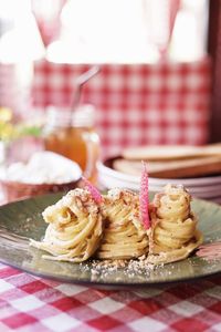 Close-up of pasta in plate on table