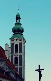 Low angle view of tower against clear blue sky