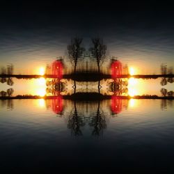 Scenic view of lake at sunset