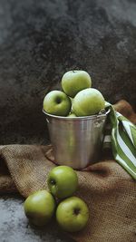 High angle view of apples in bowl on table