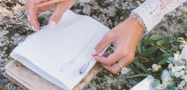 High angle view of hands of an artist