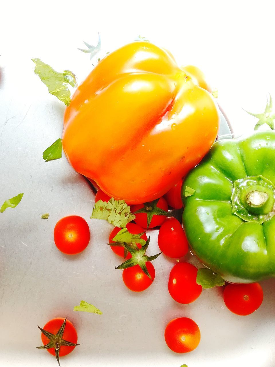 HIGH ANGLE VIEW OF BELL PEPPERS ON WHITE BACKGROUND