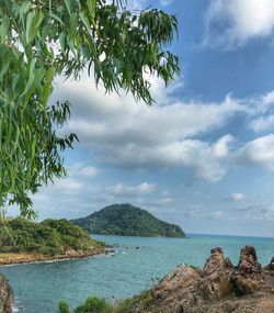 Scenic view of bay against sky