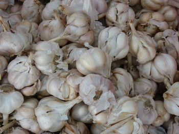 Full frame shot of garlic for sale at market