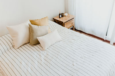 High angle view of sofa on bed at home