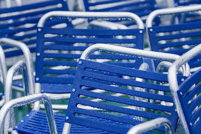 Full frame shot of wet empty chairs during rainy season