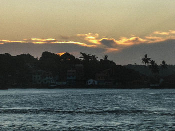 Scenic view of sea at sunset