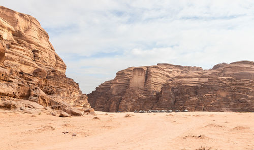 Rock formations on mountain against sky