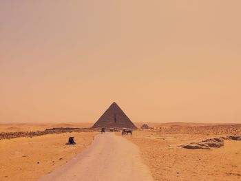 Scenic view of desert against clear sky