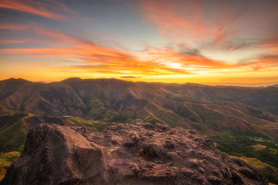 Scenic view of mountains against sky during sunset