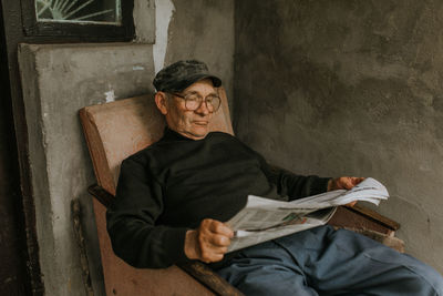 Young man reading book