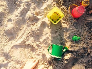 High angle view of toy on sand at beach