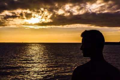 Scenic view of sea at sunset