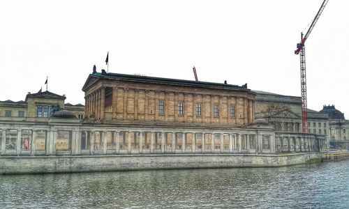 Buildings against clear sky