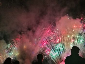 Firework display at night