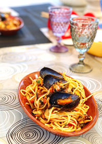 Close-up of seafood pasta in plate on table