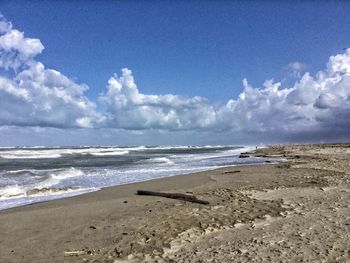 Scenic view of beach against sky