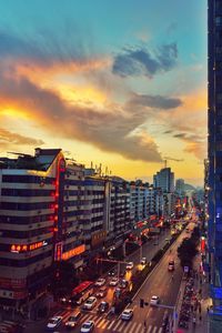 High angle view of city against sky during sunset