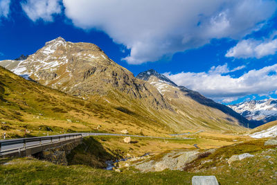 Scenic view of snowcapped mountains against sky