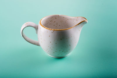Close-up of coffee cup on table
