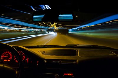 Light trails on road at night