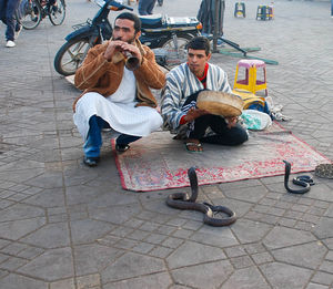 People sitting on street