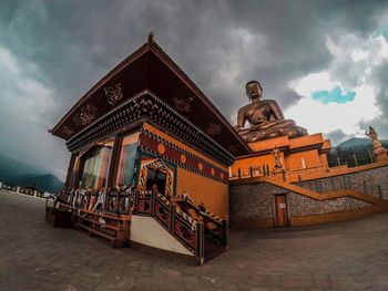 Statue of historic building against sky