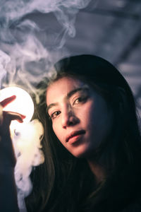 Close-up portrait of young woman