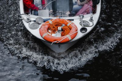 High angle view of orange boat in water