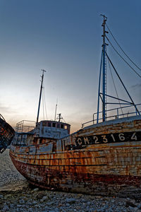 Ship at sea against sky