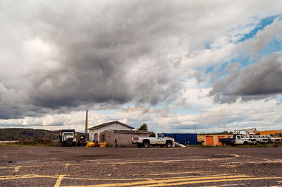 View of road against cloudy sky