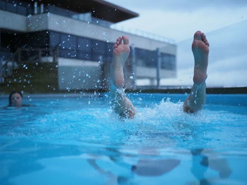 People swimming in pool