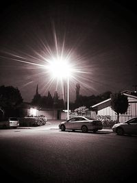 Illuminated bridge at night