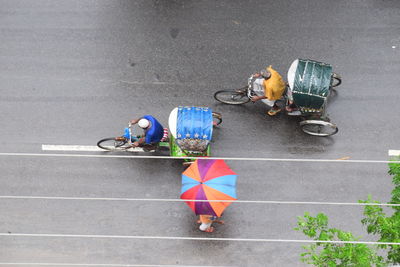 High angle view of people walking on street