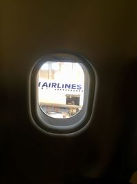 View of airplane through window