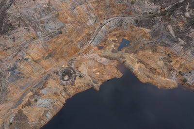 Aerial view of la union mining park landscape and ocher-tinted water lake, called red lake