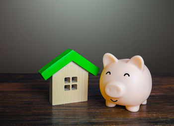 Close-up of piggy bank on table