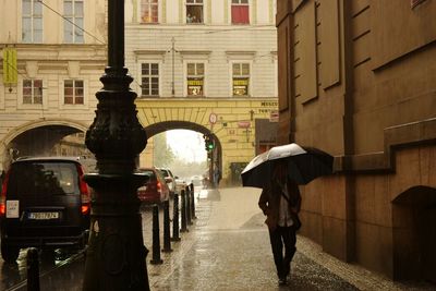 Rear view of woman walking in city