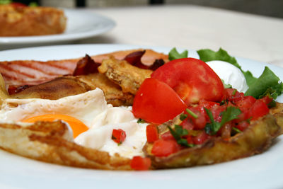 Close-up of breakfast served on plate