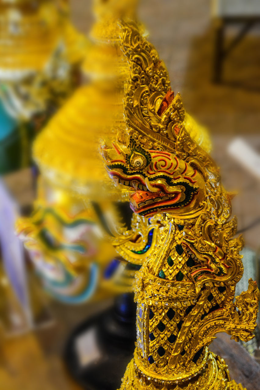 CLOSE-UP OF A STATUE OF BUDDHA